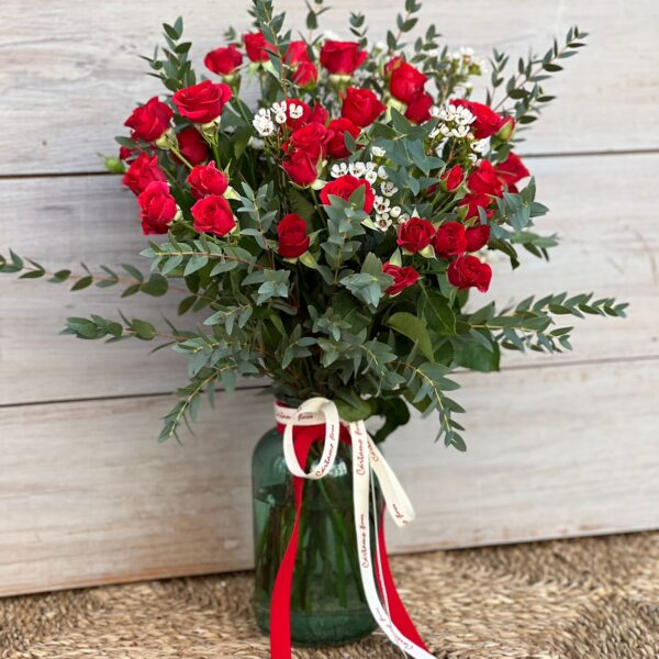 Jarrón cristal verde con rosas spray